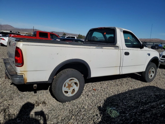 1999 Ford F-150 z VIN 1FTRF18W1XKA87801, wystawiony jako Copart lot #79094454 z przebiegiem Nie podano mil oraz Szkoda całkowita • Salvage title. Historia ofert i sprzedaży dostępna na DreamBid. Obrazek 3.