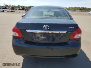2012 Toyota Yaris with VIN JTDBT4K30CL010867, listed as a Copart auction lot 54128955 with 245,262 mi miles and Salvage Title. Bid and sale history available at carsss.com. Image 6.