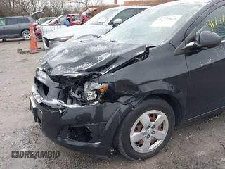 2014 Chevrolet Sonic LS with VIN 1G1JA6SH6E4139131, listed as a IAAI auction lot 41727625 with 97,241 mi miles and . Bid and sale history available at DreamBid. Image 17.