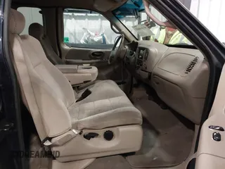 2001 Ford F-150 XL z VIN 1FTRX17L61NB44147, wystawiony jako IAAI lot #41464804 z przebiegiem 130 860 mil mil oraz . Historia ofert i sprzedaży dostępna na DreamBid. Obrazek 5.