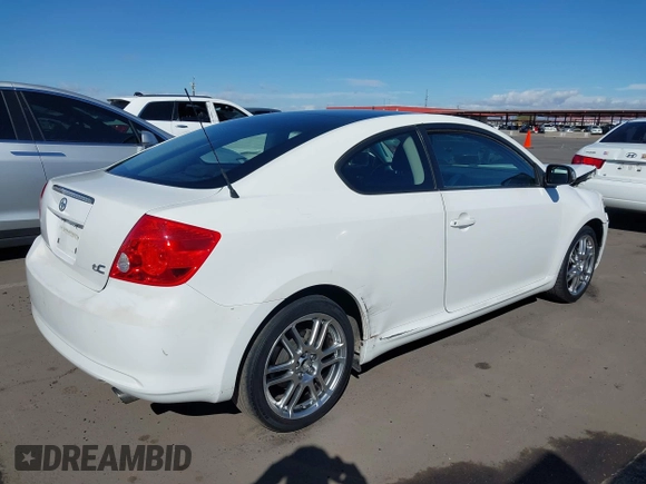 2005 Scion tC with VIN JTKDE167850026021, listed as a IAAI auction lot 41709118 with 130,895 mi miles. Bid and sale history available at carsss.com. Image 4.