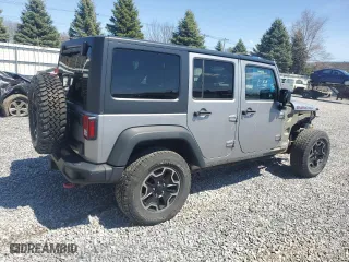 2015 Jeep Wrangler Unlimited Rubicon Hard Rock with VIN 1C4HJWFG2FL686556, listed as a Copart auction lot 54049955 with 126,675 mi miles and Salvage Title. Bid and sale history available at carsss.com. Image 3.