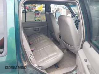 1999 Ford Explorer XLT with VIN 1FMZU34E1XZB72588, listed as a IAAI auction lot 42598441 with 233,717 mi miles and . Bid and sale history available at DreamBid. Image 8.