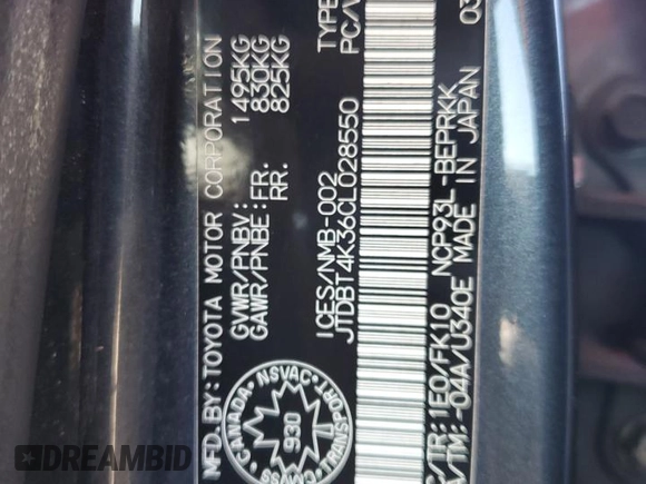 2012 Toyota Yaris with VIN JTDBT4K36CL028550, listed as a Copart auction lot 52071475 with 173,922 mi miles and Salvage Title. Bid and sale history available at DreamBid. Image 12.