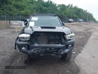 2017 Toyota Tacoma SR5 with VIN 3TMCZ5ANXHM089093, listed as a IAAI auction lot 42513711 with 86,022 mi miles and . Bid and sale history available at DreamBid. Image 12.