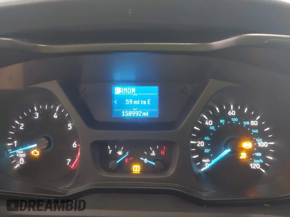 2015 Ford Transit Cargo z VIN 1FTNE1YG9FKB08497, wystawiony jako IAAI lot #42106682 z przebiegiem 158 992 mil mil oraz . Historia ofert i sprzedaży dostępna na DreamBid. Obrazek 7.