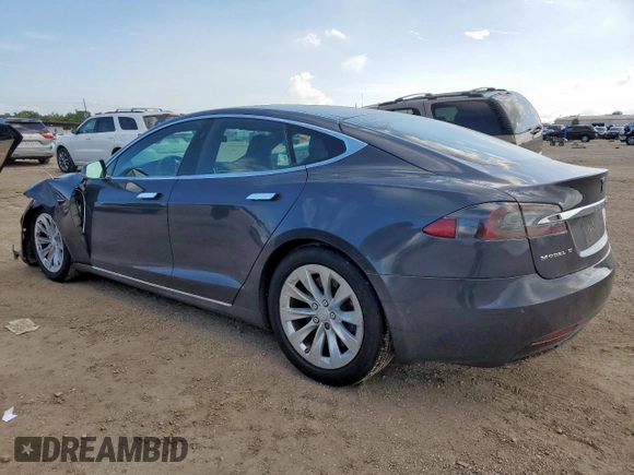 2017 Tesla Model S 100D with VIN 5YJSA1E27HF180483, listed as a Copart auction lot 62783205 with 55,744 mi miles and Salvage title. Bid and sale history available at DreamBid. Image 2.
