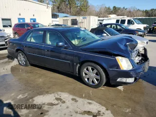 2006 Cadillac DTS 1SB z VIN 1G6KD57Y56U220535, wystawiony jako Copart lot #89196185 z przebiegiem 94 312 mil mil oraz Szkody całkowita. Historia ofert i sprzedaży dostępna na DreamBid. Obrazek 4.
