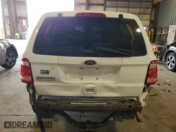 2011 Ford Escape XLS с VIN 1FMCU0C78BKC53371, выставлен на аукционе Copart как лот 54767005 с пробегом 227 192 миль миль и Списание • Salvage title. История ставок и продаж доступна на DreamBid. Изображение 6.