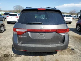 2017 Honda Odyssey Touring with VIN 5FNRL5H91HB013660, listed as a Copart auction lot 54246815 with 79,501 mi miles and Clean title. Bid and sale history available at DreamBid. Image 6.