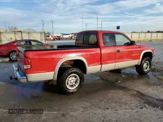 1997 Dodge Dakota z VIN 1B7GG23X0VS187346, wystawiony jako Copart lot #79128194 z przebiegiem 116 778 mil mil oraz Szkoda całkowita • Salvage title. Historia ofert i sprzedaży dostępna na DreamBid. Obrazek 3.
