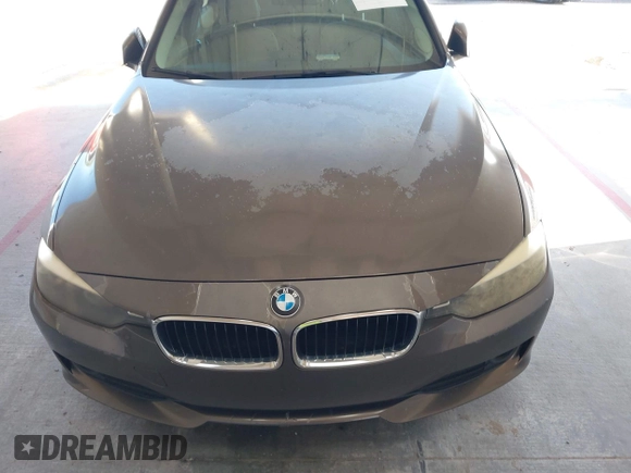 2013 BMW 3 Series 320i with VIN WBA3B1C54DK129838, listed as a IAAI auction lot 42752788 with 95,262 mi miles and . Bid and sale history available at DreamBid. Image 6.