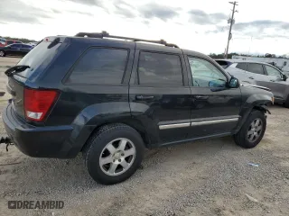 2010 Jeep Grand Cherokee Laredo with VIN 1J4PS4GK7AC117852, listed as a Copart auction lot 89107185 with 167,357 mi miles and Salvage Title. Bid and sale history available at carsss.com. Image 3.