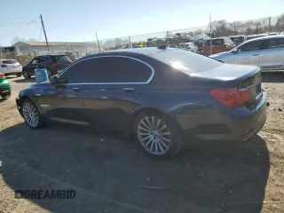 2011 BMW 7 Series 750i xDrive с VIN WBAKC6C59BC394610, выставлен на аукционе Copart как лот 52459035 с пробегом 171 581 миль миль и Списание • Salvage title. История ставок и продаж доступна на DreamBid. Изображение 2.