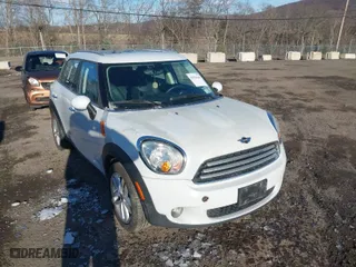 2014 MINI Cooper Countryman with VIN WMWZB3C58EWM32024, listed as a IAAI auction lot 41594143 with NaN miles. Bid and sale history available at carsss.com. Image 6.