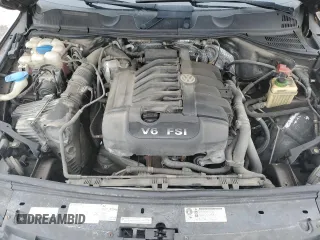2012 Volkswagen Touareg Sport z VIN WVGEF9BP8CD006057, wystawiony jako Copart lot #47739265 z przebiegiem 213 580 mil mil oraz Szkoda całkowita • Salvage title. Historia ofert i sprzedaży dostępna na DreamBid. Obrazek 11.