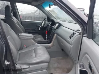 2005 Honda Pilot EX-L with NAVI with VIN 2HKYF18745H567671, listed as a IAAI auction lot 41577393 with 178,182 mi miles. Bid and sale history available at carsss.com. Image 5.
