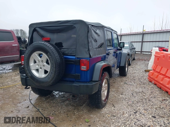 2009 Jeep Wrangler Unlimited X with VIN 1J4GA39189L787777, listed as a IAAI auction lot 41570579 with 193,163 mi miles. Bid and sale history available at carsss.com. Image 4.