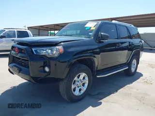 2014 Toyota 4Runner SR5 z VIN JTEZU5JR7E5077539, wystawiony jako IAAI lot #41851723 z przebiegiem 180 388 mil mil oraz . Historia ofert i sprzedaży dostępna na DreamBid. Obrazek 2.