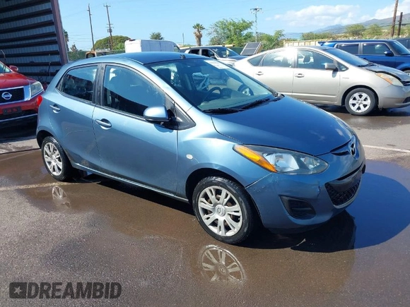 2014 Mazda 2 Sport with VIN JM1DE1KY0E0181555, listed as a IAAI auction lot 41539841 with 121,918 mi miles and . Bid and sale history available at DreamBid. Image 1.