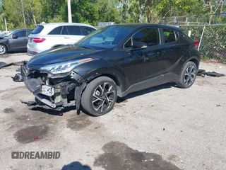 2021 Toyota C-HR LE with VIN NMTKHMBX7MR126165, listed as a IAAI auction lot 41848045 with 26,882 mi miles. Bid and sale history available at carsss.com. Image 17.