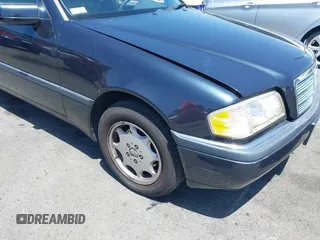 1997 Mercedes-Benz C z VIN WDBHA23EXVA514988, wystawiony jako IAAI lot #42503544 z przebiegiem 142 312 mil mil oraz . Historia ofert i sprzedaży dostępna na DreamBid. Obrazek 6.