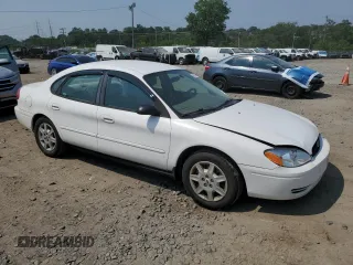 2005 Ford Taurus SE z VIN 1FAHP53U65A184099, wystawiony jako Copart lot #60960015 z przebiegiem Nie podano mil oraz Szkoda całkowita • Salvage title. Historia ofert i sprzedaży dostępna na DreamBid. Obrazek 4.