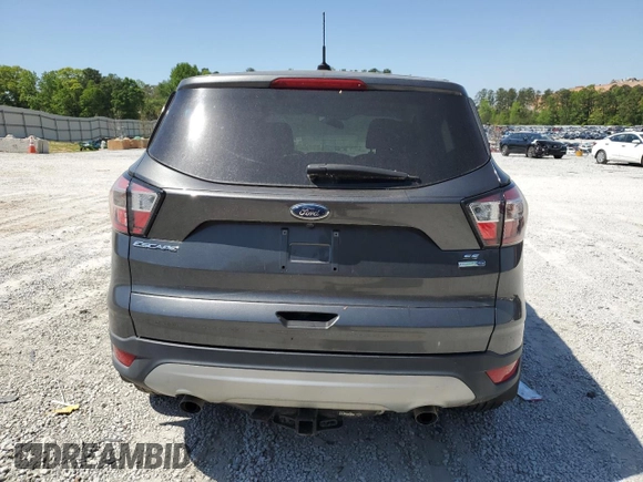 2017 Ford Escape SE z VIN 1FMCU9GD4HUE42763, wystawiony jako Copart lot #53512165 z przebiegiem 50 248 mil mil oraz Szkoda całkowita • Salvage title. Historia ofert i sprzedaży dostępna na DreamBid. Obrazek 6.