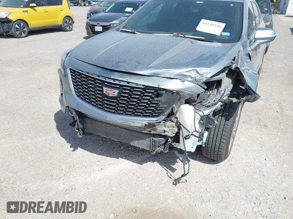 2023 Cadillac XT4 AWD Premium Luxury with VIN 1GYFZDR47PF163923, listed as a IAAI auction lot 42136236 with 52,012 mi miles and . Bid and sale history available at DreamBid. Image 6.