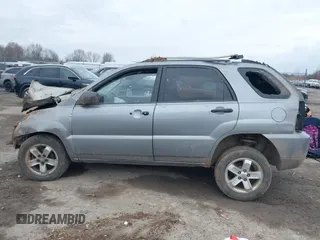 2010 Kia Sportage LX with VIN KNDKGCA33A7718634, listed as a IAAI auction lot 41868565 with 197,967 mi miles and . Bid and sale history available at carsss.com. Image 14.