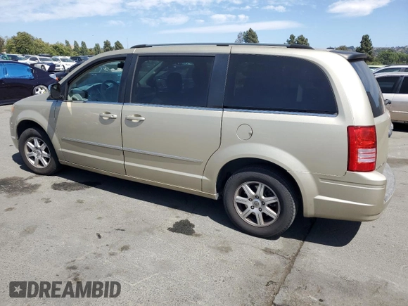 2010 Chrysler Town & Country Touring z VIN 2A4RR5D13AR257765, wystawiony jako Copart lot #61048635 z przebiegiem 165 220 mil mil oraz Czysty tytuł • Clean title. Historia ofert i sprzedaży dostępna na DreamBid. Obrazek 2.