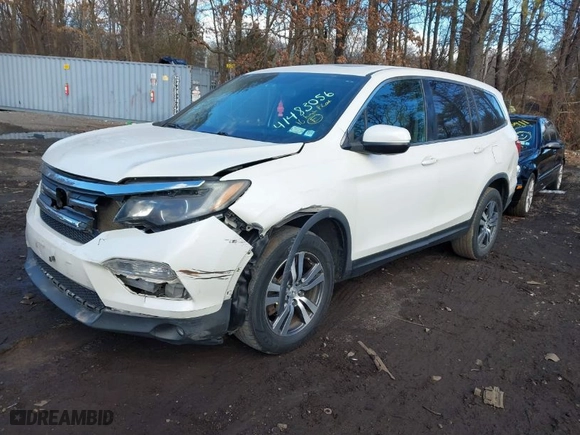 2016 Honda Pilot EX-L with VIN 5FNYF6H52GB057395, listed as a IAAI auction lot 41483056 with 121,805 mi miles. Bid and sale history available at carsss.com. Image 2.