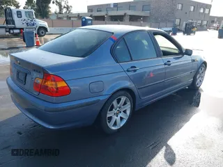 2002 BMW 3 Series 325i with VIN WBAET374X2NG72824, listed as a IAAI auction lot 41822437 with 1 mi miles. Bid and sale history available at carsss.com. Image 4.