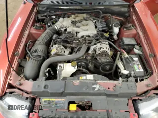 2002 Ford Mustang Standard z VIN 1FAFP40442F189502, wystawiony jako Copart lot #60606665 z przebiegiem 72 751 mil mil oraz Czysty tytuł • Clean title. Historia ofert i sprzedaży dostępna na DreamBid. Obrazek 11.