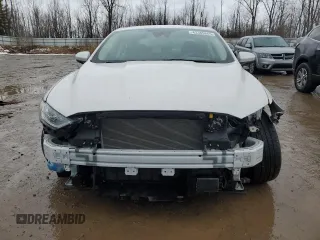 2020 Ford Fusion SE z VIN 3FA6P0HDXLR246898, wystawiony jako Copart lot #43389665 z przebiegiem 22 355 mil mil oraz Czysty tytuł • Clean title. Historia ofert i sprzedaży dostępna na DreamBid. Obrazek 5.