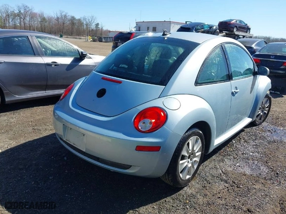 2010 Volkswagen New Beetle Coupe with VIN 3VWRW3AG2AM018644, listed as a IAAI auction lot 41815380 with 99,738 mi miles. Bid and sale history available at carsss.com. Image 4.