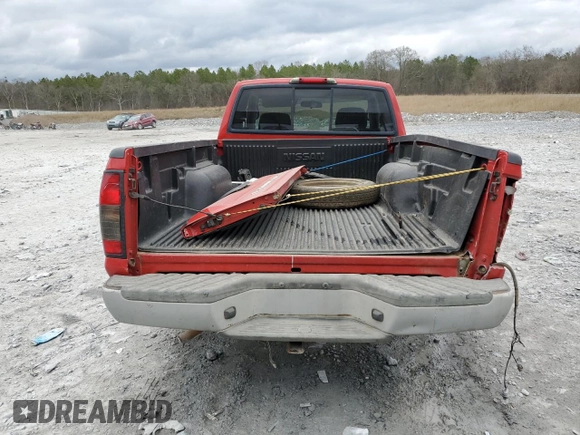 2004 Nissan Frontier XE z VIN 1N6DD26T94C470094, wystawiony jako Copart lot #44387355 z przebiegiem 216 052 mil mil oraz Szkoda całkowita • Salvage title. Historia ofert i sprzedaży dostępna na DreamBid. Obrazek 6.