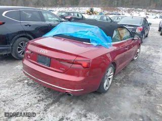 2019 Audi A5 Cabriolet Premium Plus with VIN WAUYNGF56KN002340, listed as a IAAI auction lot 41521638 with 69,381 mi miles. Bid and sale history available at carsss.com. Image 4.