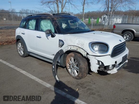 2019 MINI Countryman Cooper with VIN WMZYV5C55K3E05106, listed as a IAAI auction lot 41514627 with 69,399 mi miles. Bid and sale history available at carsss.com. Image 1.