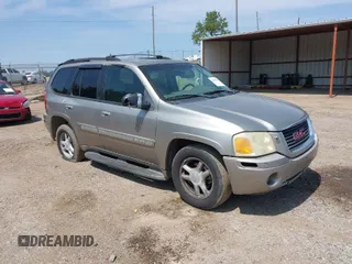 2002 GMC Envoy SLT with VIN 1GKDS13S422446808, listed as a IAAI auction lot 41896943 with 271,771 mi miles. Bid and sale history available at carsss.com. Image 1.