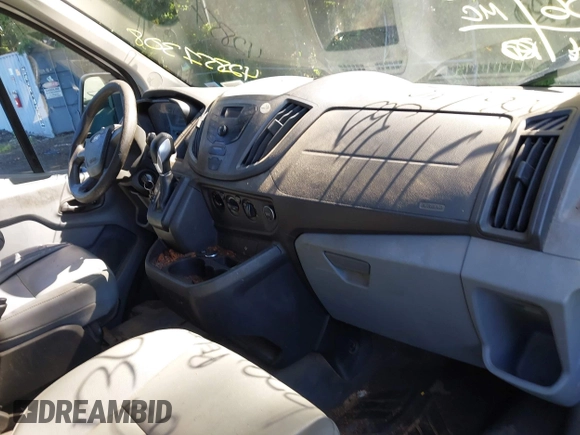 2016 Ford Transit Cargo with VIN 1FTYR1ZM2GKB06257, listed as a IAAI auction lot 42851308 with 239,006 mi miles and . Bid and sale history available at DreamBid. Image 5.