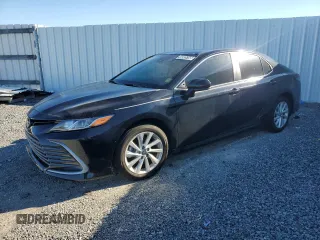 2023 Toyota Camry LE z VIN 4T1C11AK9PU127599, wystawiony jako Copart lot #44935185 z przebiegiem 8 746 mil mil oraz Czysty tytuł • Clean title. Historia ofert i sprzedaży dostępna na DreamBid. Obrazek 1.