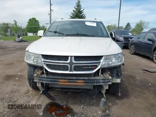 2012 Dodge Journey SXT with VIN 3C4PDCBG4CT372642, listed as a IAAI auction lot 42238499 with 172,033 mi miles and . Bid and sale history available at DreamBid. Image 13.