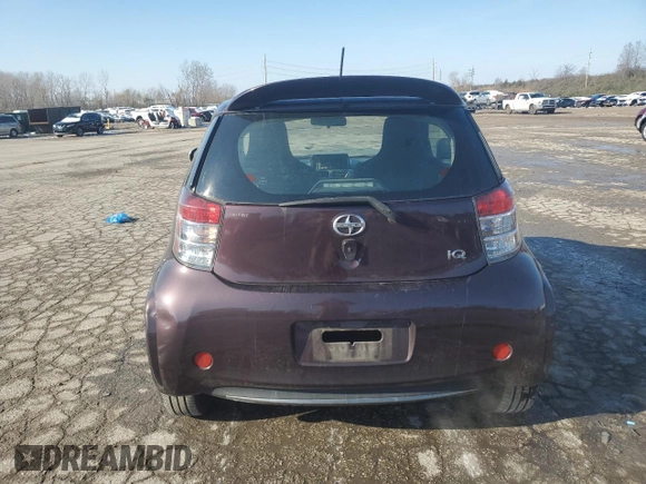 2012 Scion iQ z VIN JTNJJXB00CJ014966, wystawiony jako Copart lot #83100954 z przebiegiem 100 775 mil mil oraz Szkoda całkowita • Salvage title. Historia ofert i sprzedaży dostępna na DreamBid. Obrazek 6.