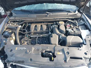 2013 Ford Taurus SEL z VIN 1FAHP2E84DG193376, wystawiony jako IAAI lot #41661721 z przebiegiem 136 341 mil mil oraz . Historia ofert i sprzedaży dostępna na DreamBid. Obrazek 10.