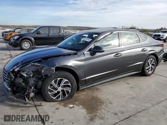 2022 Hyundai Sonata Hybrid Blue with VIN KMHL24JJ5NA051528, listed as a Copart auction lot 82478744 with 66,784 mi miles and Salvage Title. Bid and sale history available at carsss.com. Image 1.