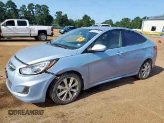 2012 Hyundai Accent GLS with VIN KMHCU4AE6CU265646, listed as a Copart auction lot 61283355 with 97,479 mi miles and Salvage title. Bid and sale history available at DreamBid. Image 1.