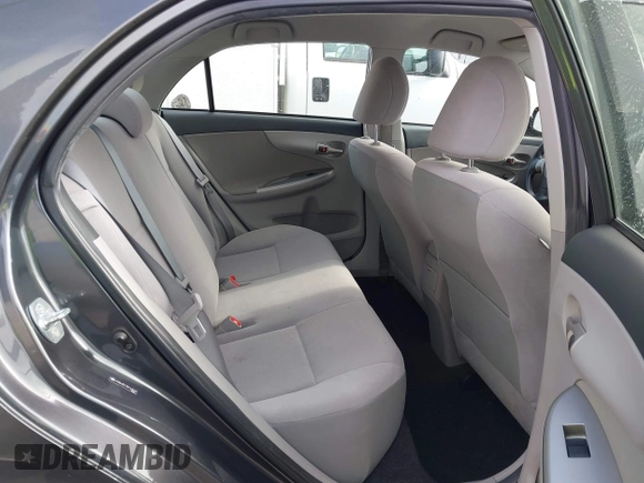 2011 Toyota Corolla L with VIN JTDBU4EE7B9162022, listed as a IAAI auction lot 42066643 with 124,384 mi miles. Bid and sale history available at carsss.com. Image 8.