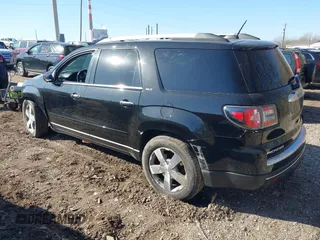 2016 GMC Acadia SLT with VIN 1GKKVRKD2GJ248452, listed as a IAAI auction lot 41739758 with 149,104 mi miles. Bid and sale history available at carsss.com. Image 3.