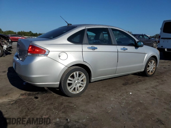2010 Ford Focus SEL with VIN 1FAHP3HN8AW216909, listed as a Copart auction lot 70152774 with 124,521 mi miles and Clean Title. Bid and sale history available at carsss.com. Image 3.